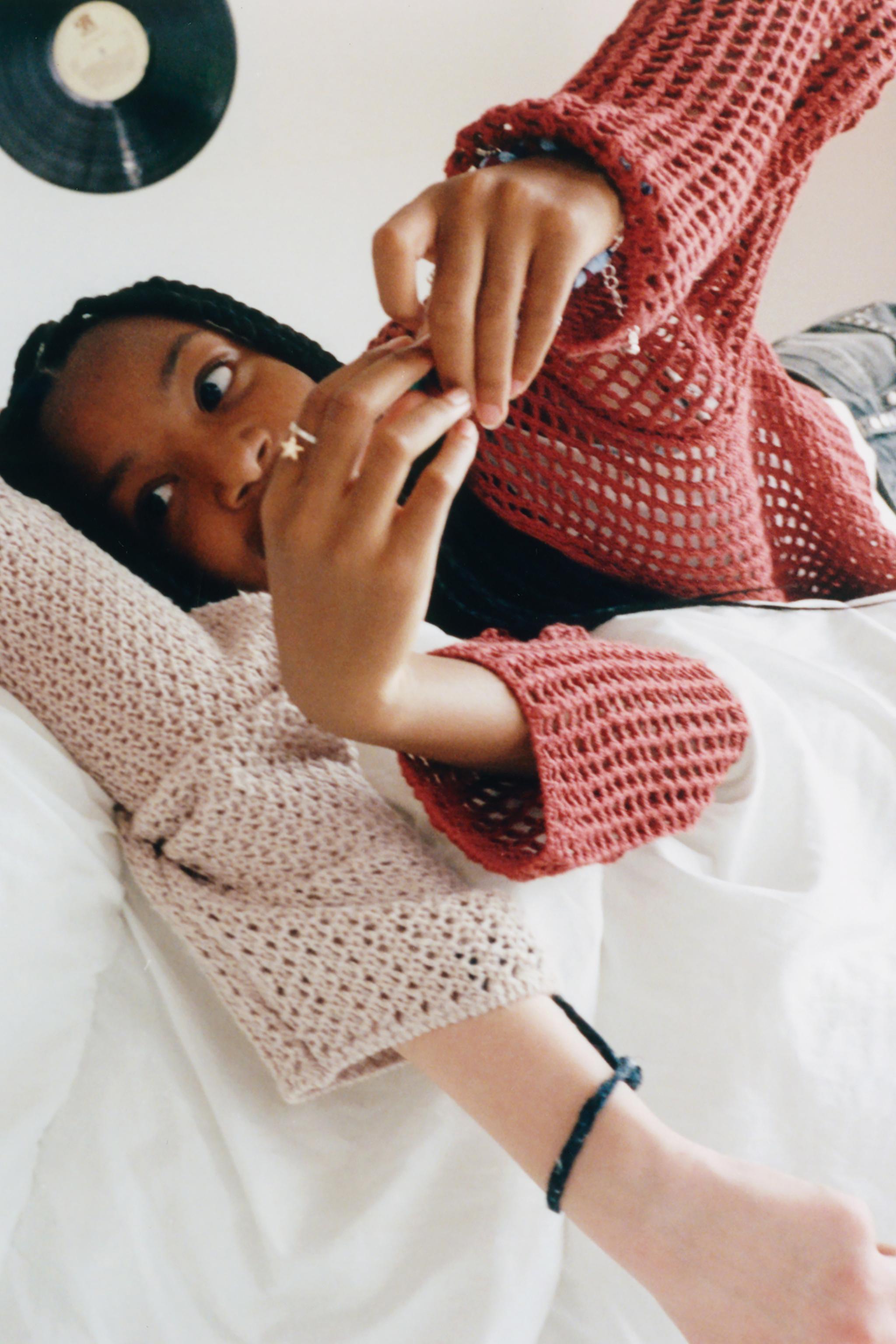PULL EN MAILLE À FRANGES